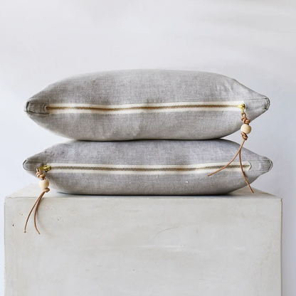 Oatmeal gray linen pillow with brass zipper, side view