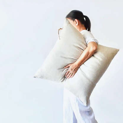 Oatmeal gray linen pillow with brass zipper, detail view